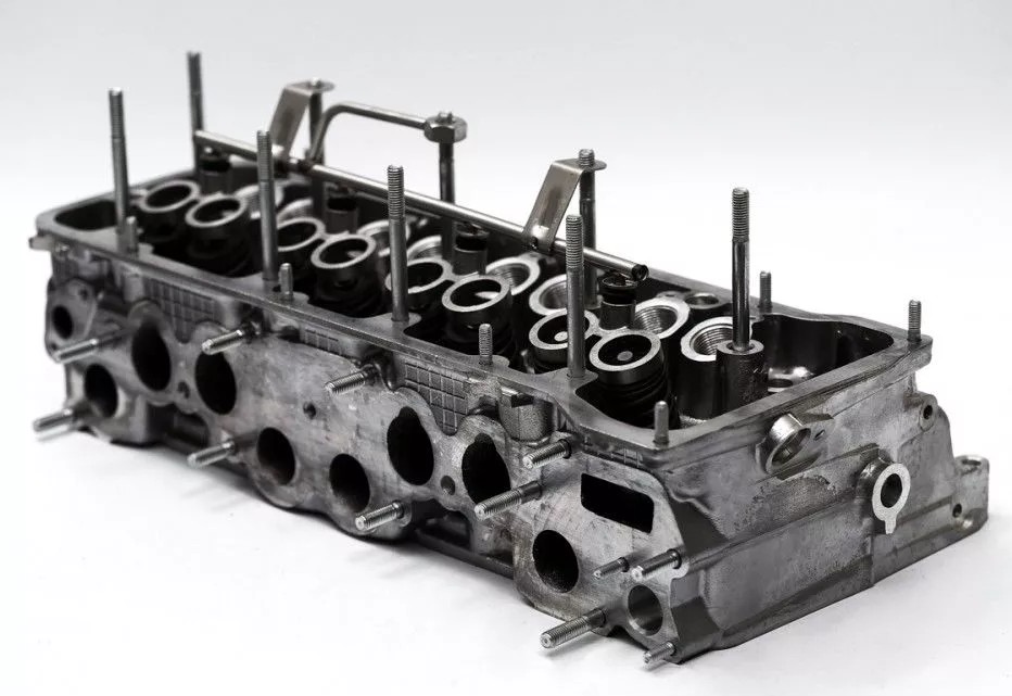 Головка блока 21214 нов.обр. в сборе(гидроком.н/об)